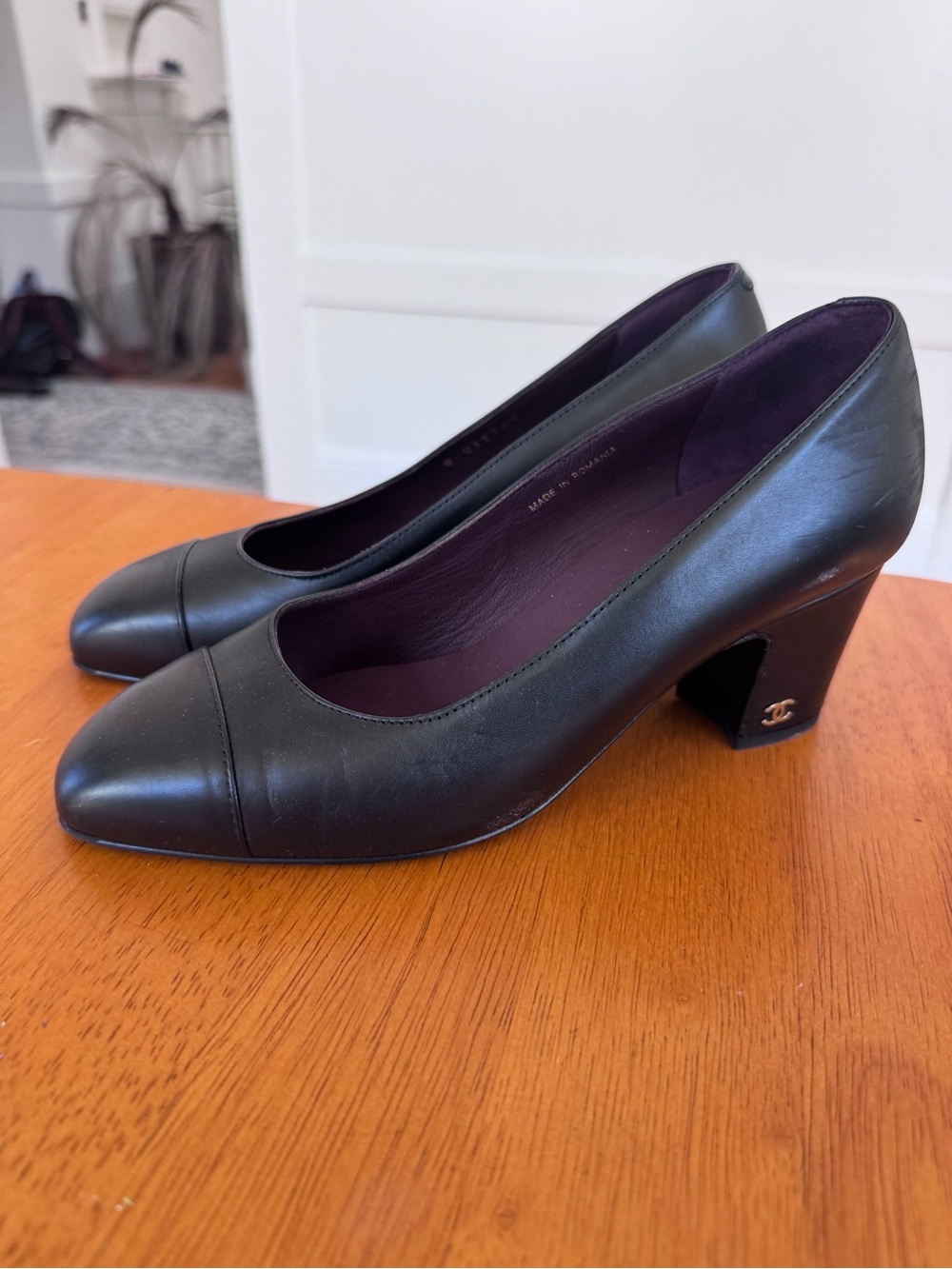 CHANEL Black Leather Block Heel Pumps with Gold CC Accent